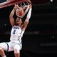 Keldon Johnson of Team USA gets some air time against Iran.